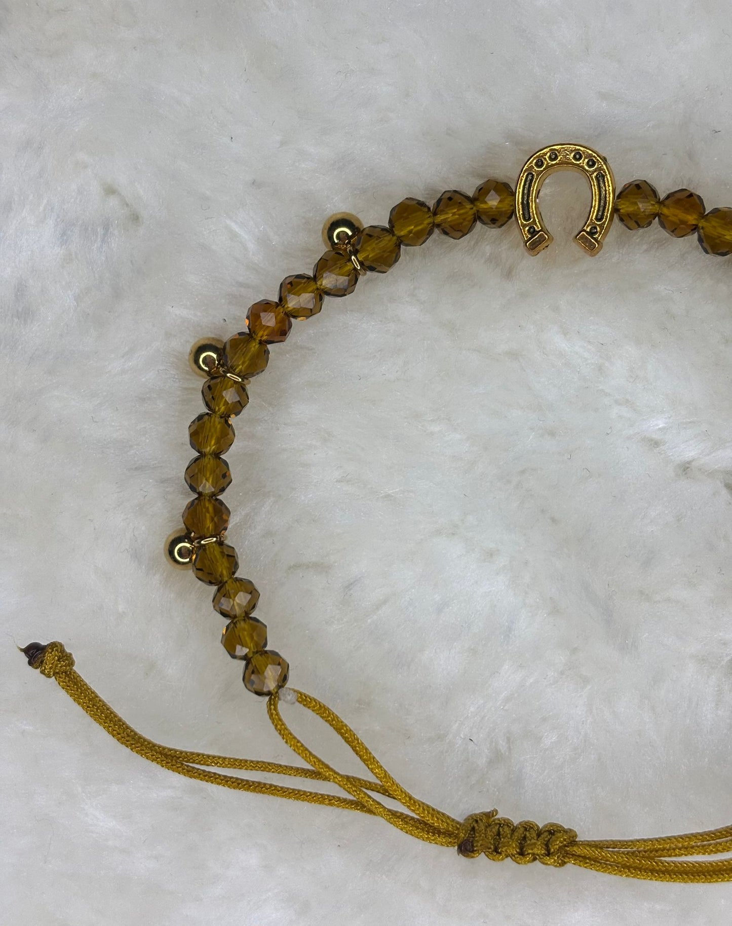 PULSERA MARONA MIEL CON BOLITAS DORADAS